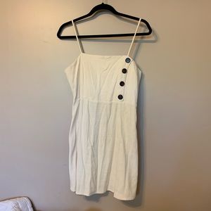 Cream mini dress with button detail